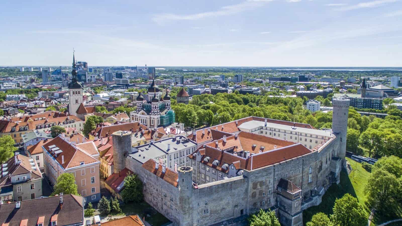 Aerial view of Tallinn Old Town, with medieval walls and the modern city behind