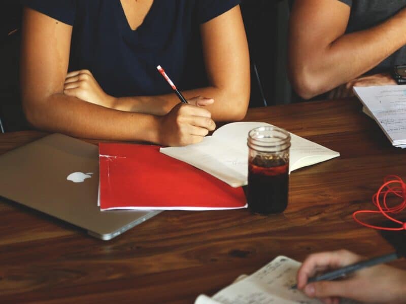 Members of a non-profit association working together at a table